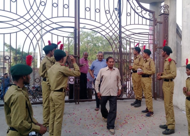 Flower petals being showered to welcome voters