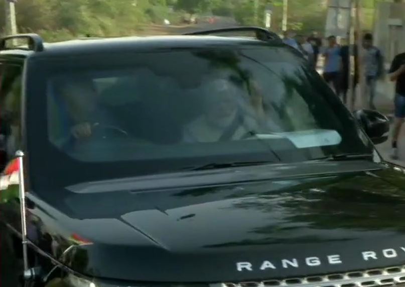 Prime Minister Narendra Modi arrives at his mother's residence in Gandhinagar