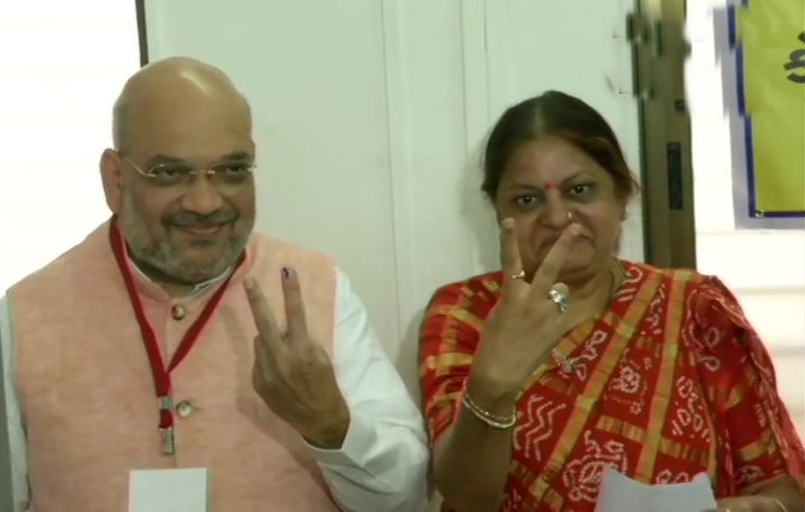 BJP President Amit Shah and his wife Sonal Shah cast their votes