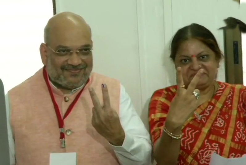 BJP President Amit Shah and his wife Sonal Shah cast their votes