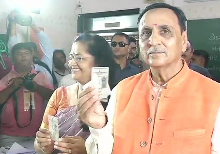 M Vijay Rupani and wife Anjali cast their vote