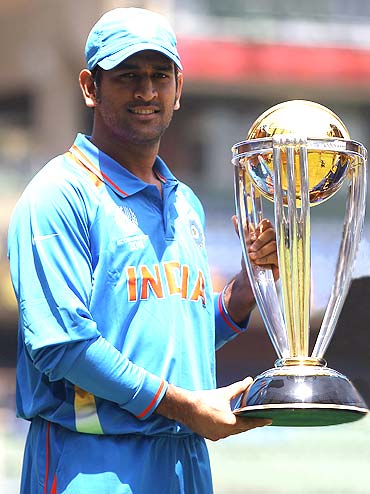 Dhoni with 2011 WC