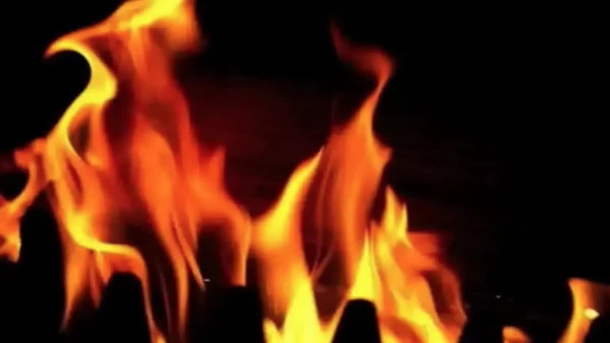 Father throws baby girl into fire