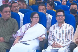 Abhishek meets Mamata