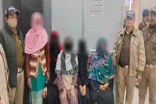Five arrested Women with police