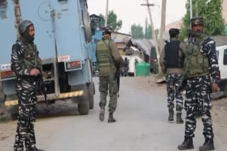 Security forces at an encounter site in Kashmir