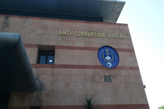 acb action in bribe case