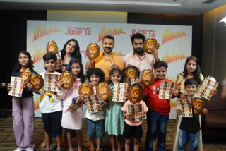 GRRRR FILM  ACTORS GIFTED LION MASK TO CHILDREN  KUNCHACKO BOBAN  SURAJ VENJARAMOODU