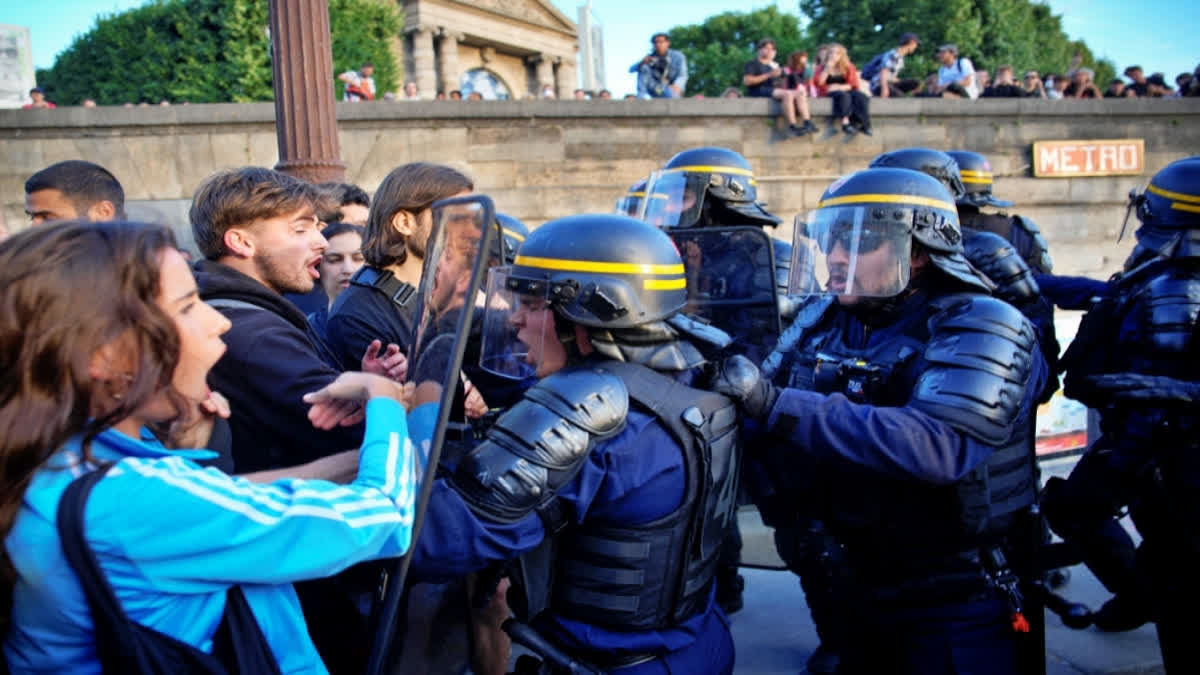 Hundreds of people were arrested in overnight as young rioters clash with police in France