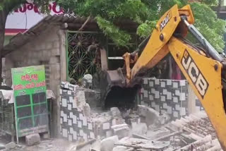 Officials Demolish Illegal Shops at NTR District