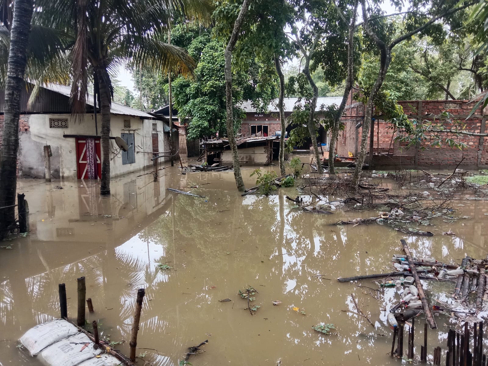 floods in different parts of assam have caused disruption in life