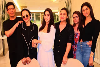 Veteran actor Rekha attended a get-together at designer Manish Malhotra's residence in Mumbai. The 69-year-old actor looked uber-stylish as she struck a pose with Manish, Janhvi Kapoor, Parineeti Chopra, and Kushi Kapoor.