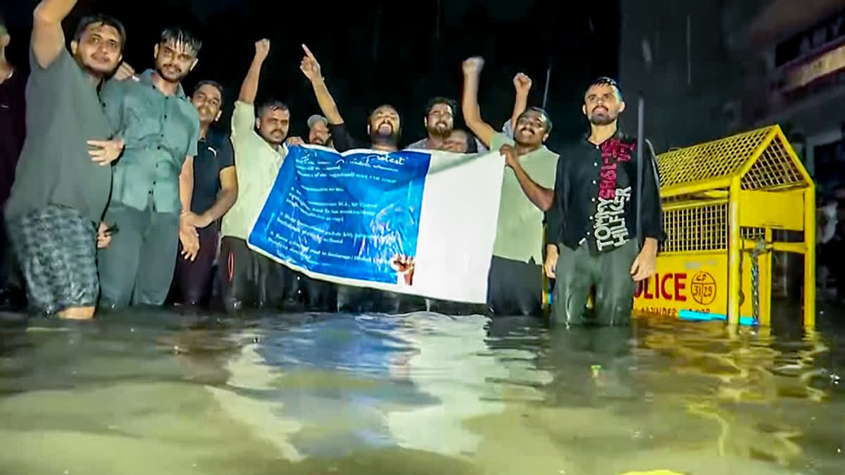 Students protest on Wednesday evening amid severe waterlogging due to heavy rains in Old Rajinder Nagar. Three students drowned in the area in the basement of a coaching institute on 27 July.