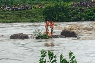 MANDLA WOMAN TRAPPED IN RIVER