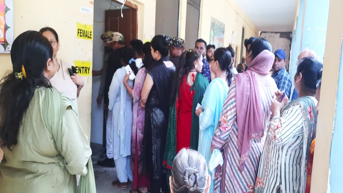 Woman voters of Valmiki Samaj queue up for voting in Jammu