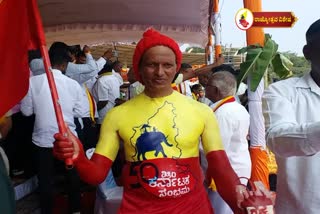 blood-donor-celebrated-kannada-rajyotsava-by-applying-himself-yellow-and-red-paint