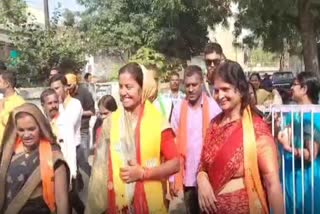 Door to door election campaign during Karva Chauth