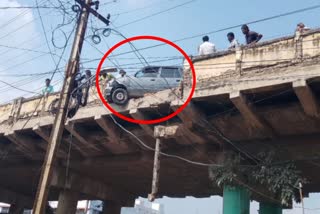 Car Stuck on Side Wall of Bridge in Adoni