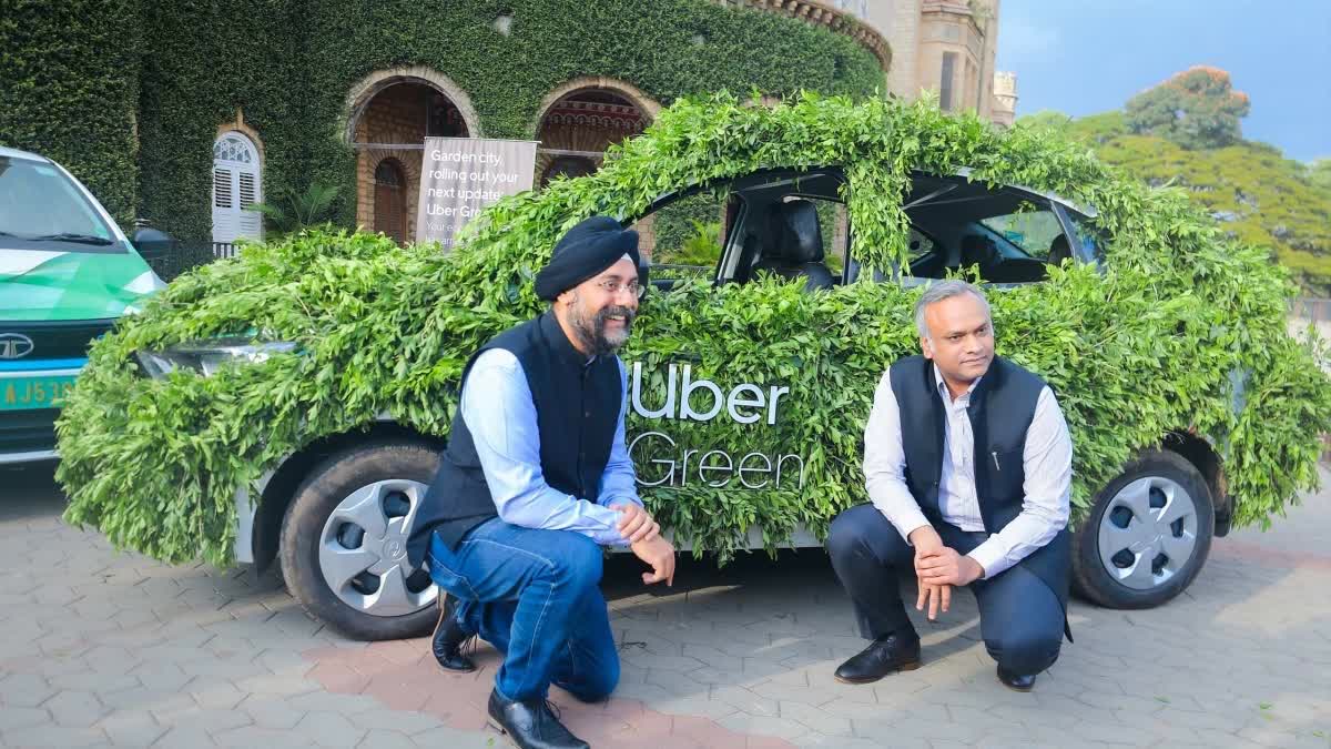 Uber Announces Green Vehicles In Bengaluru  Uber Green Service In Bengaluru  Minister Priyank Kharge  Tech Summit  Uber Green In Bengaluru  ഫ്ലാഗ്‌ ഓഫ് ചെയ്‌ത് മന്ത്രി പ്രിയങ്ക് ഖാര്‍ഗെ  മന്ത്രി പ്രിയങ്ക് ഖാര്‍ഗെ  ഊബര്‍ ഗ്രീന്‍  യാത്രകള്‍ക്കായി ഇനി ഇ കാര്‍  ഇ കാര്‍  ബെംഗളൂരുവില്‍ ഊബര്‍ ഗ്രീന്‍  മന്ത്രി പ്രിയങ്ക് ഖാര്‍ഗെ  ഊബര്‍ ഗ്രീന്‍ സേവനം ബെംഗളൂരുവിലും  Tech Summit 2023  ഊബര്‍ ഗ്രീന്‍ ഓപ്‌ഷന്‍