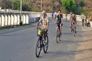 IIT professor traveling on bicycle