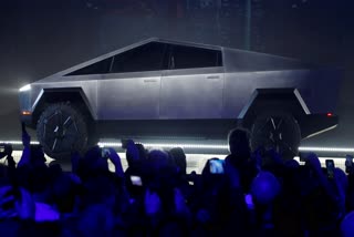 Tesla CEO Elon Musk is expected to give an update on manufacturing problems with long-awaited Cybertruck at an event Thursday marking the first deliveries of the futuristic, angular pickup truck.