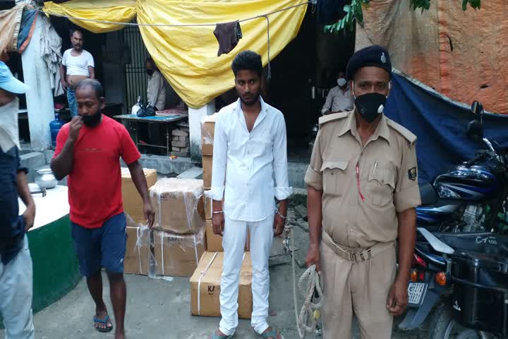 smuggler arrested with 100 cartoon liquor 