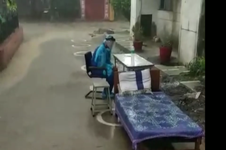 Doctors treating patients outside the building at Rohini ESI Hospital