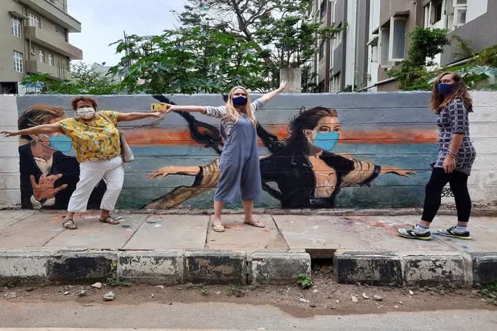 Titanic pose where Rose and Jack with mask; art by Badal Nanjundaswamy of banglore