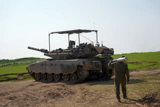 Israeli media said Roi Yifrachspent time fighting in Gaza and even appeared in a photo next to Prime Minister Benjamin Netanyahu during one of his visits to soldiers in the field.