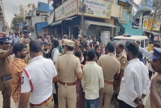roadblock protest against the chit fund company for defrauding the invested money