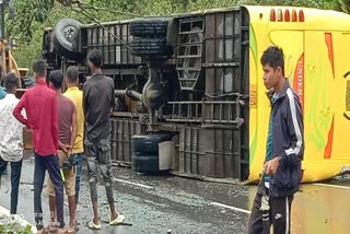 Agartala-Guwahat bus overturns in Dima Hasao  Assam (photo etv bharat)