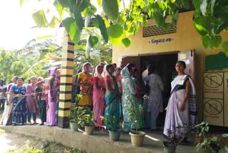 Women standing in queue to vote for Panchayat elections
