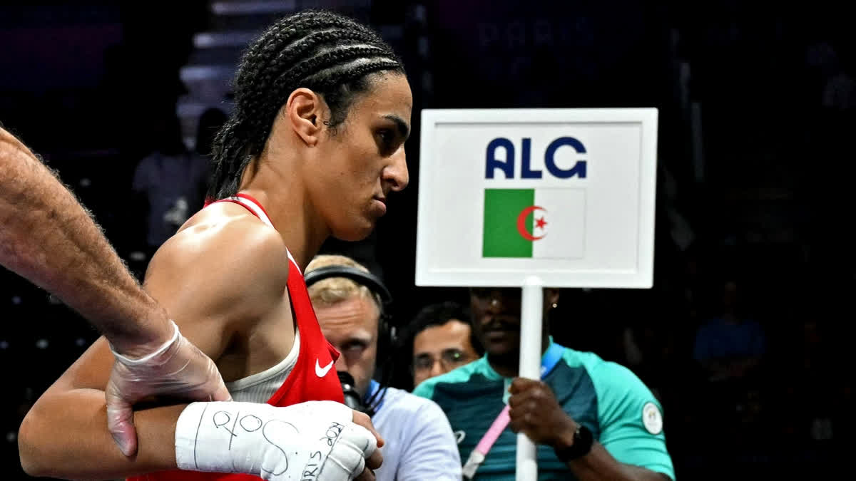 Algerian female boxer Imane Khelif is getting abused on social media after the Italian boxer Angela Carini quit their round of 16 welterweight bout after just 46 seconds in the ongoing Paris 2024 Olympics on Thursday. The sports enthusiasts have also questioned the IOC why they allowed Khelif to compete in the tournament, labelling her "Biological Man." So, let's just delve into the controversy and understand is Imane Khelife is a Biological Man or A Trans Woman?"