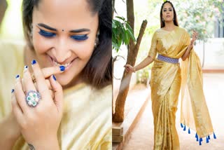 Anasuya New Photo Shoot in gold colour saree