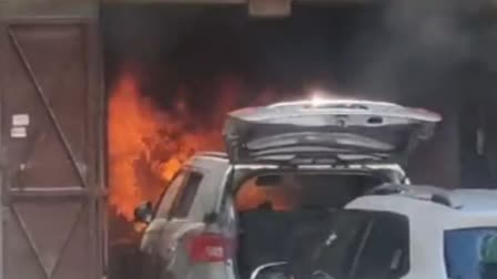 massive fire broke out in car parked for repair