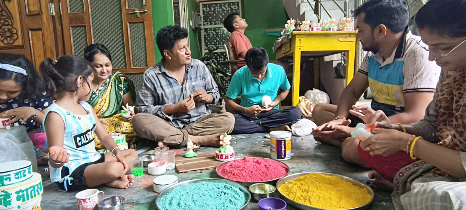 STATAION MASTER MAKING GANESH IDOLS