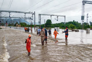 The heavy rains have disrupted road and rail traffic, with at least 99 trains cancelled and 54 diverted. Thousands have been evacuated to relief camps as rivers overflow.