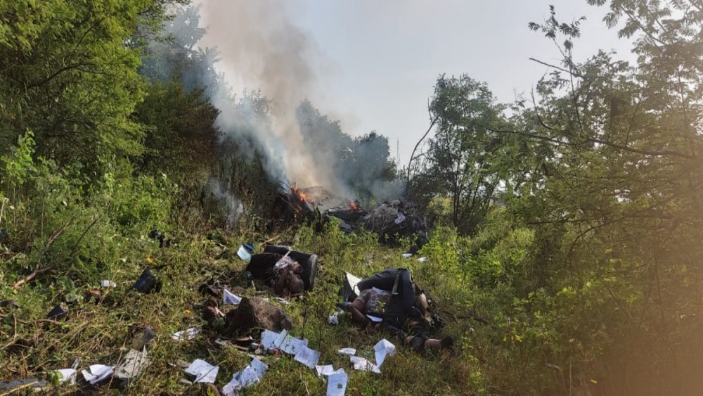 Wreckage of a helicopter after it crashed at Bavdhan area in Pune district on Wednesday