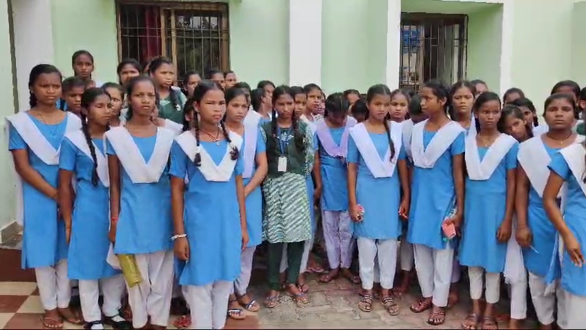 Students Walk To Meet Collector