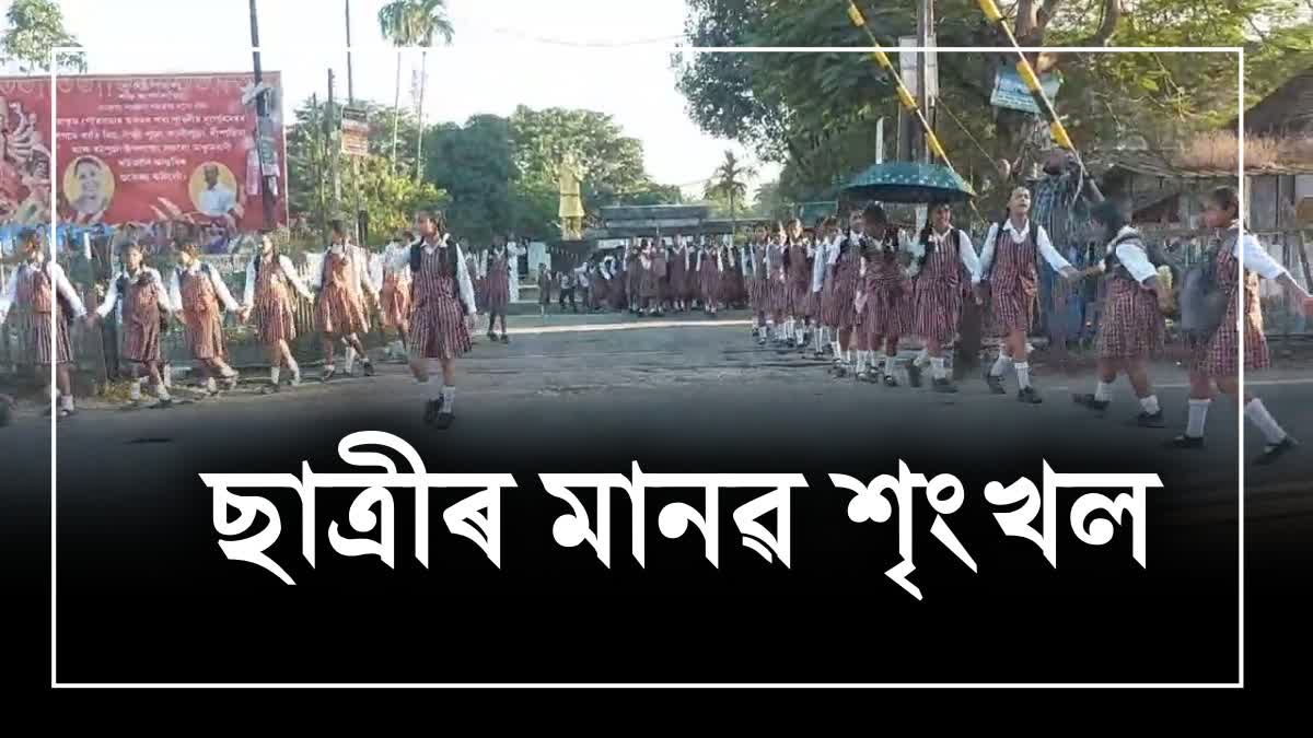 Human chain of senior students at Makum