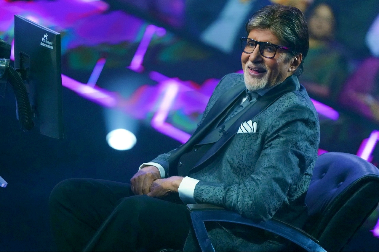 Actor Amitabh Bachchan in one of Guddu's creations as host of KBC