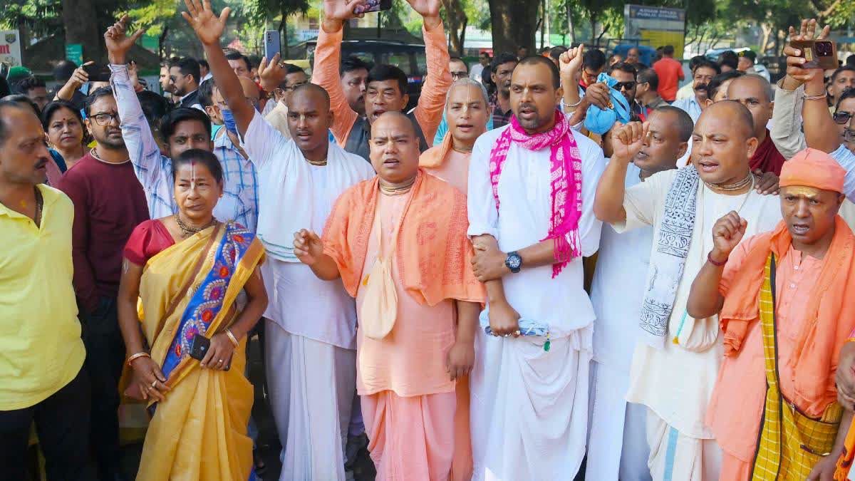 Members of Hindu Sangarsh Samity stage a protest march demanding the release of Hindu monk Chinmoy Krishna Das, at Agartala on Monday