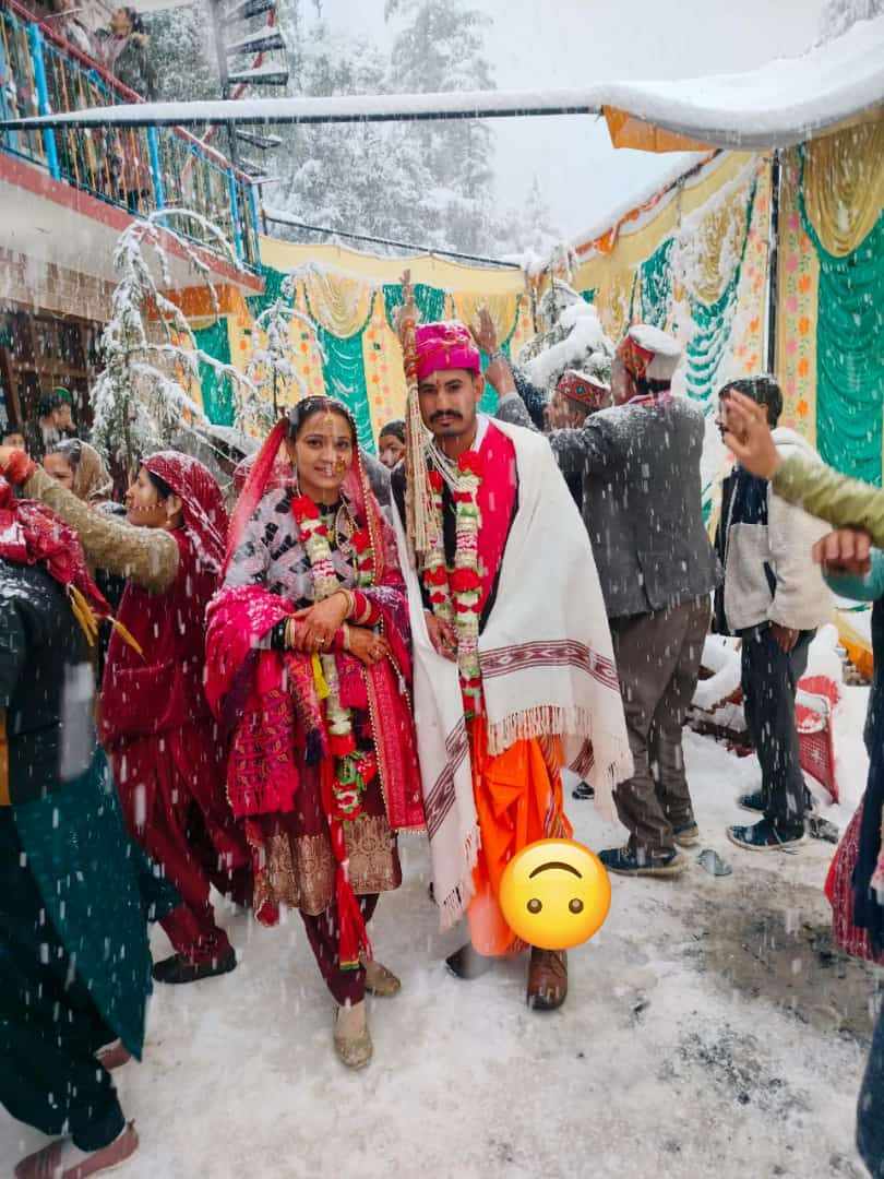 wedding celebration during snowfall