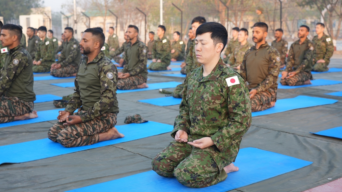 India-Japan army troops perform Yoga