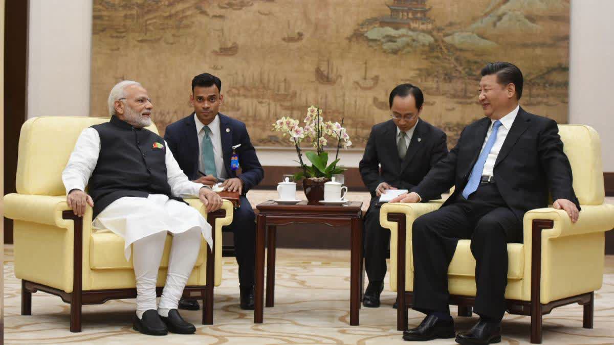 PM મોદી અને શી જિનપિંગની તસવીર