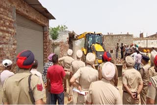 2 HOUSES DEMOLISHED DRUG SMUGGLERS