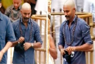 Dhanush new look  dhanush bald look  dhanush look for film D50  dhanush shaves head at tirupathi  dhanushi visit to tirupathi temple  Danush at tirupati with sons  തിരുപ്പതി ക്ഷേത്രദര്‍ശനം നടത്തി ധനുഷ്  വീഡിയോ വൈറല്‍  ക്ഷേത്രദര്‍ശനം നടത്തി ധനുഷ്  ധനുഷ്  ധനുഷിന്‍റെ പുതിയ രൂപം  ധനുഷിന്‍റെ ചിത്രങ്ങളും വീഡിയോകളും  ധനുഷിന്‍റെ ഈ ക്ഷേത്ര ദര്‍ശനം  Dhanush  Dhanush is unrecognisable as he tonsure his head  D50  ക്യാപ്‌റ്റന്‍ മില്ലര്‍