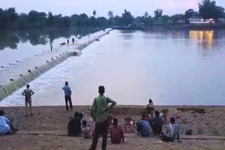 youth crossing bridge drown in river