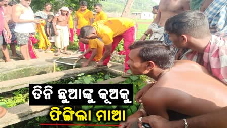 Woman throwing children into well