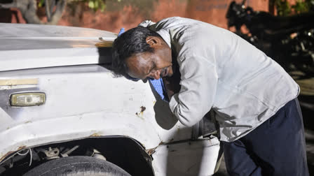 Kin of a Hathras stampede victim breaks down outside a hospital on Wednesday.